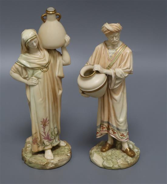 A pair of Worcester blush ivory porcelain figures tallest 27cm